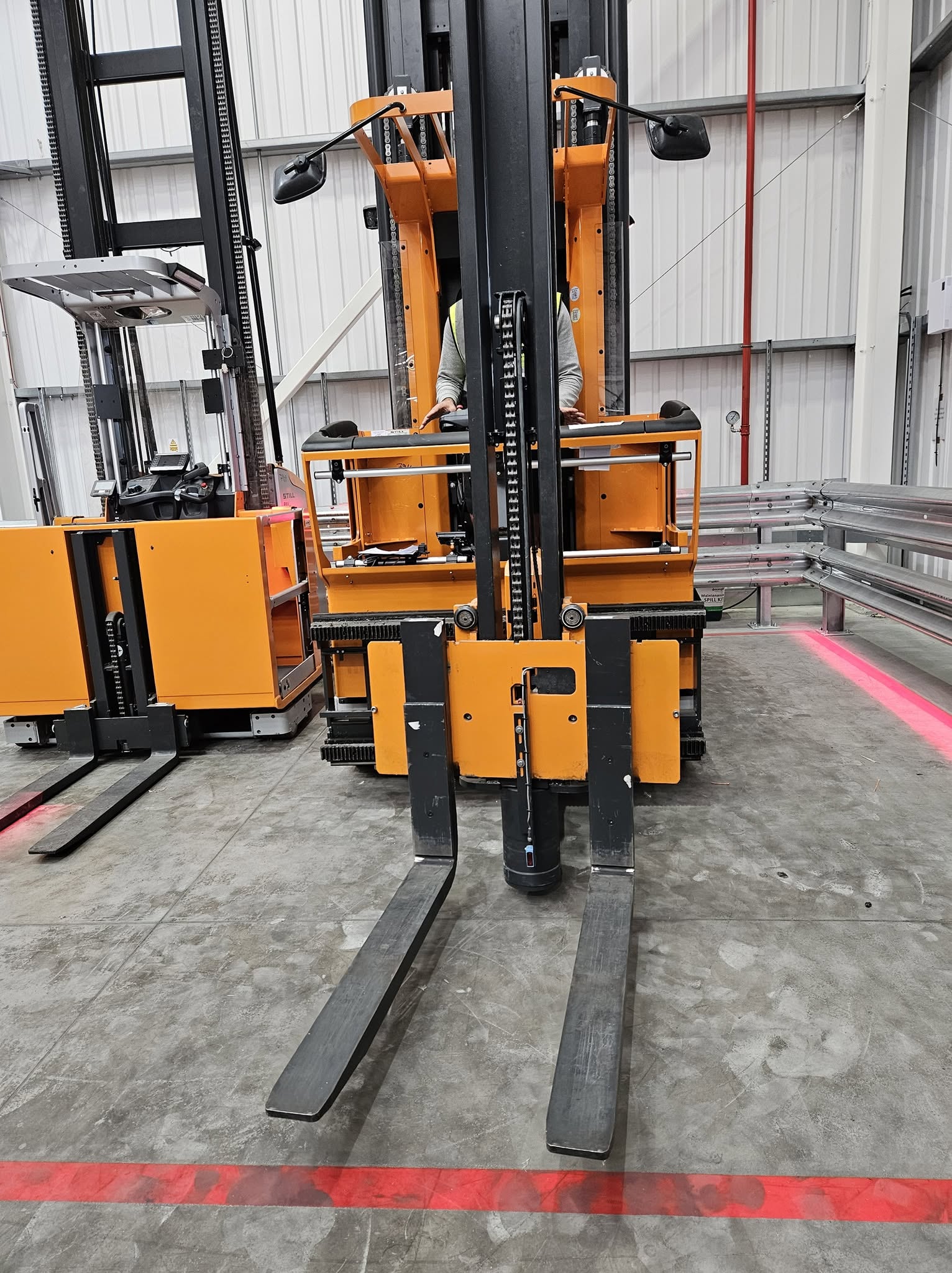 Forklift operator receiving practical workplace training